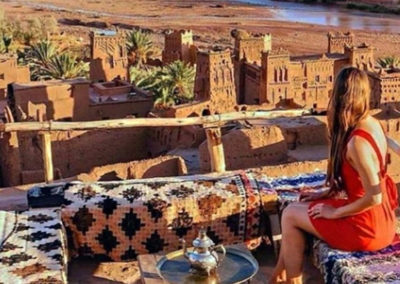 Lady with a red dress in Ait Ben Haddou