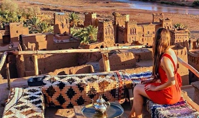 Lady with a red dress in Ait Ben Haddou